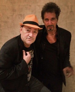 Al Pacino and Angel Salazar, who were in Scarface together, pose backstage after PAcino's Mirage show