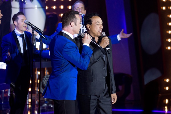 Smokey Robinson performs with Human Nature at the celebration of the group's 1,000th show